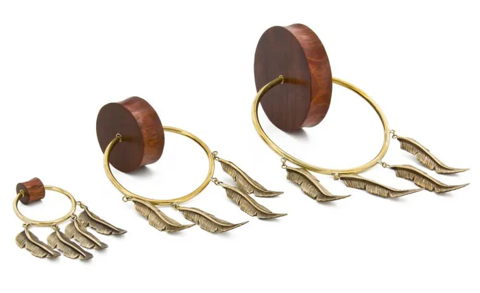 Elementals Organics Male Sex Toys Double Flare Tiger Wood Plug with Polished Bronze Feather Charms Price Per 1 Elementals Organics Male Sex Toys Double Flare Tiger Wood Plug with Polished Bronze Feather Charms Price Per 1